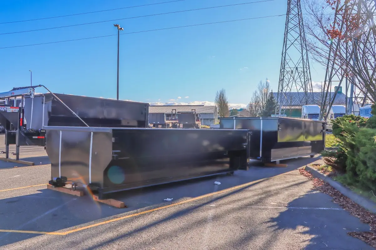Roll-off dumpster ready for waste disposal at job site for Demolition Dumpster Rental in Huron